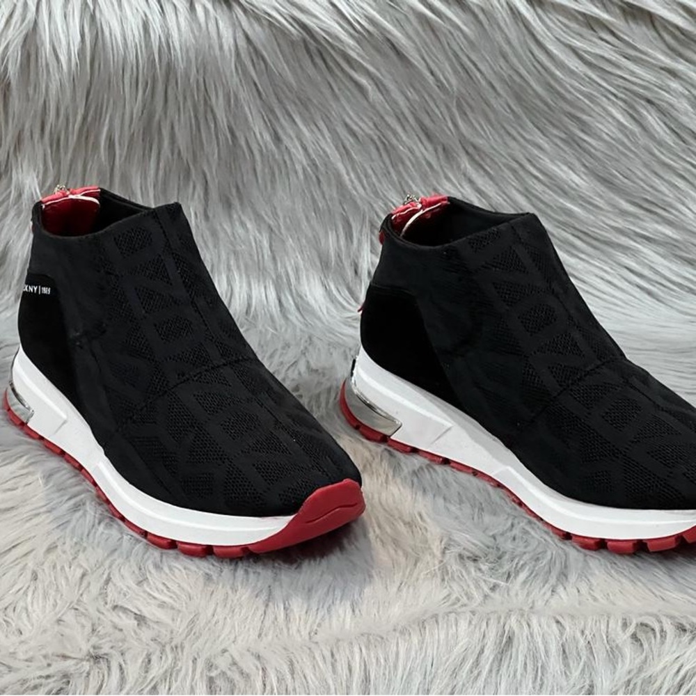 DKNY Women’s Stretch knit fashion sneakers. Slip on with a back zipper